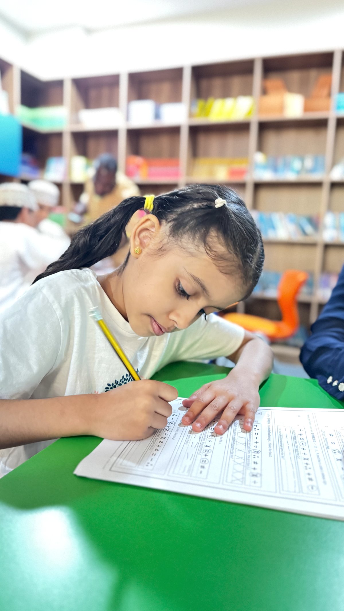 Student working through a brain development exercise